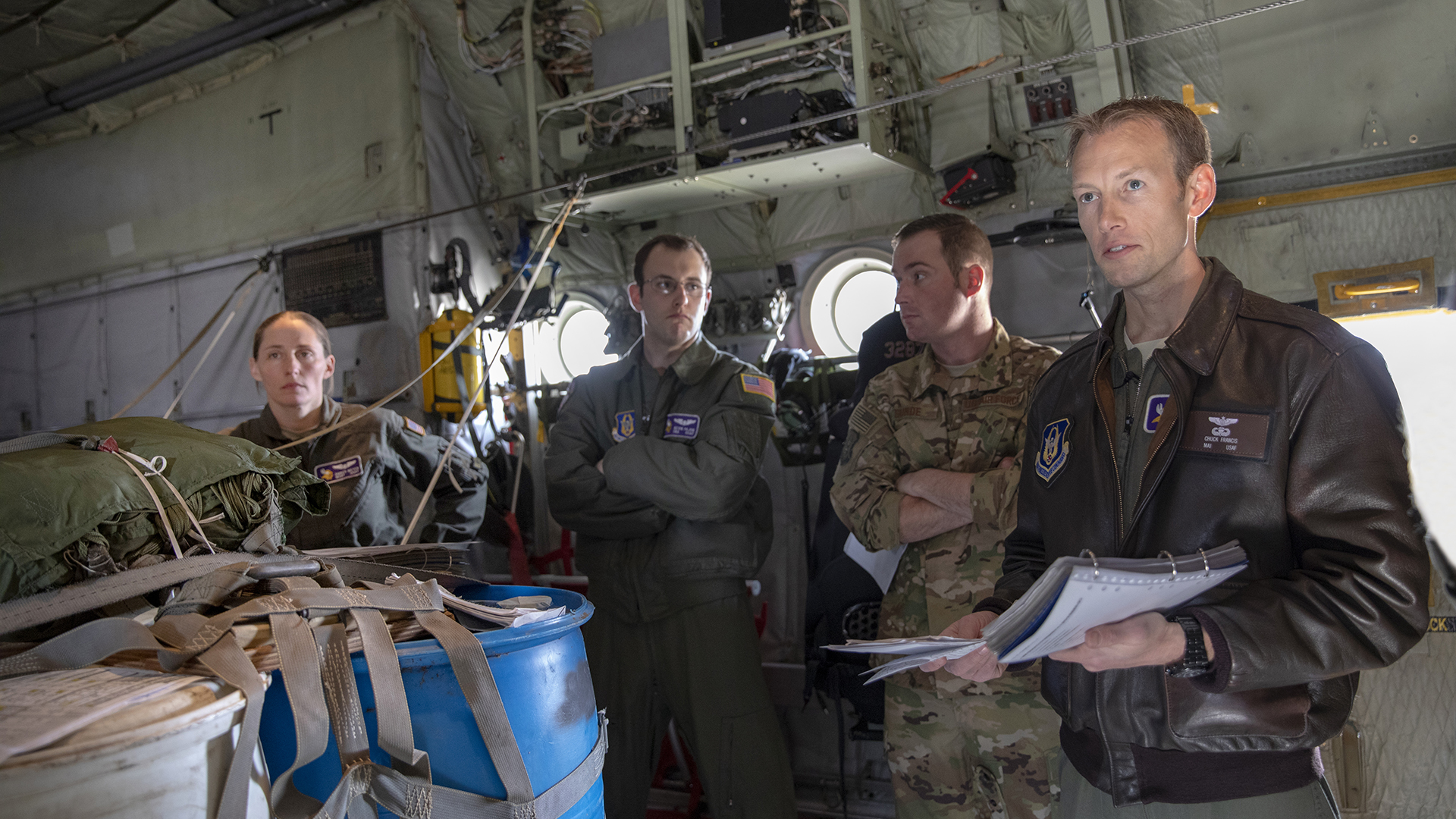 photo - military members inside airplane