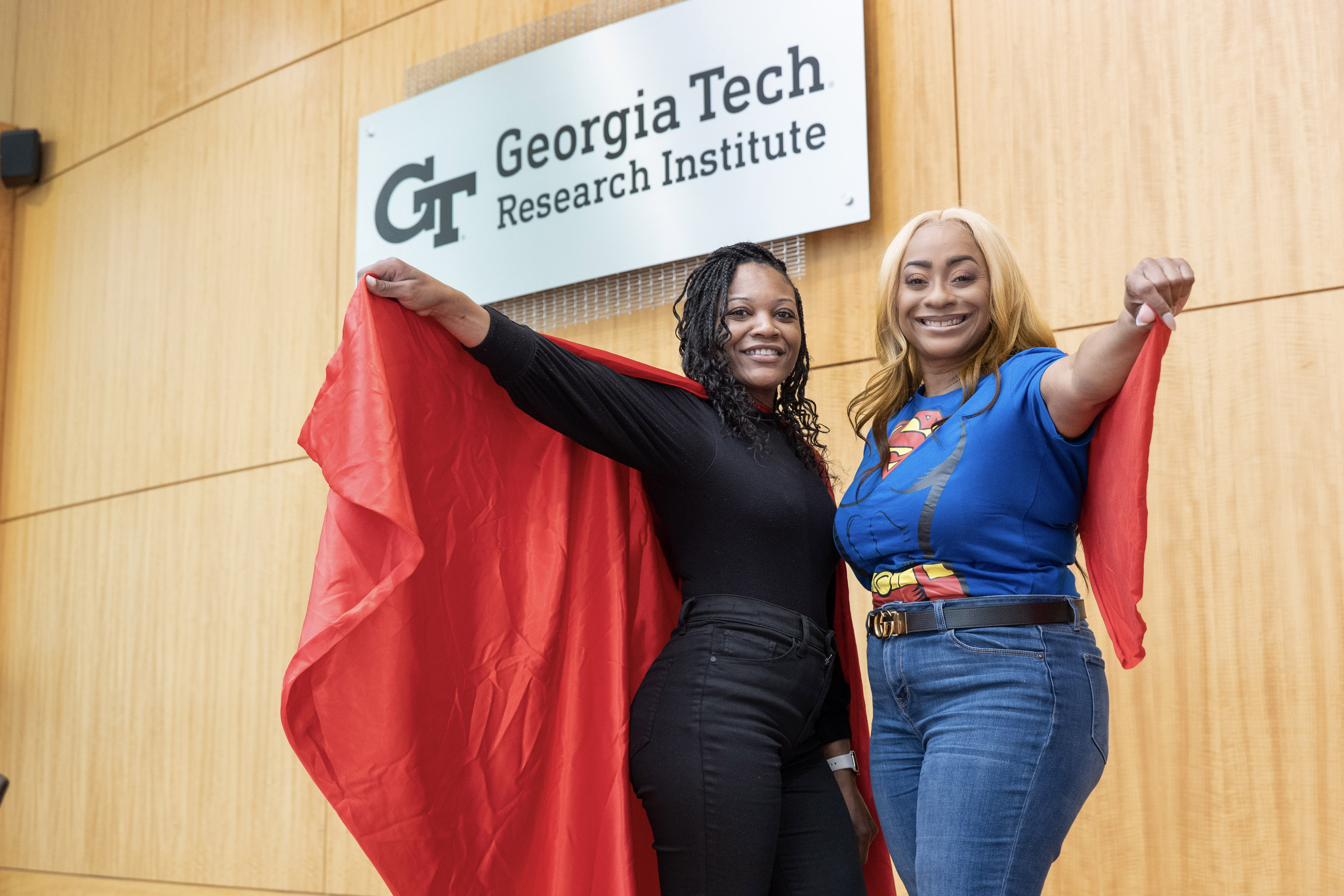 two GTRI employees at the conference center