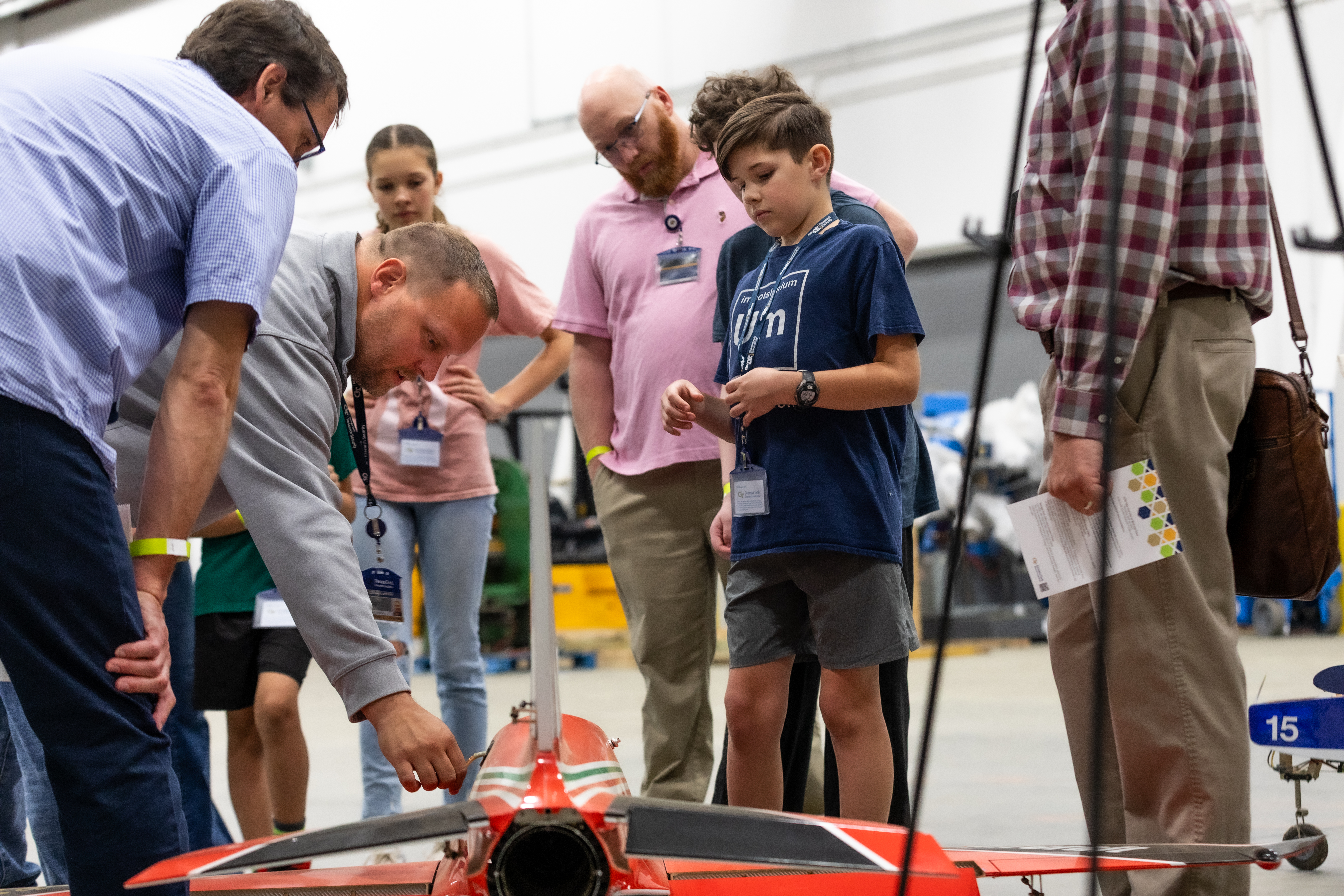 researcher pointing to drone during demonstration