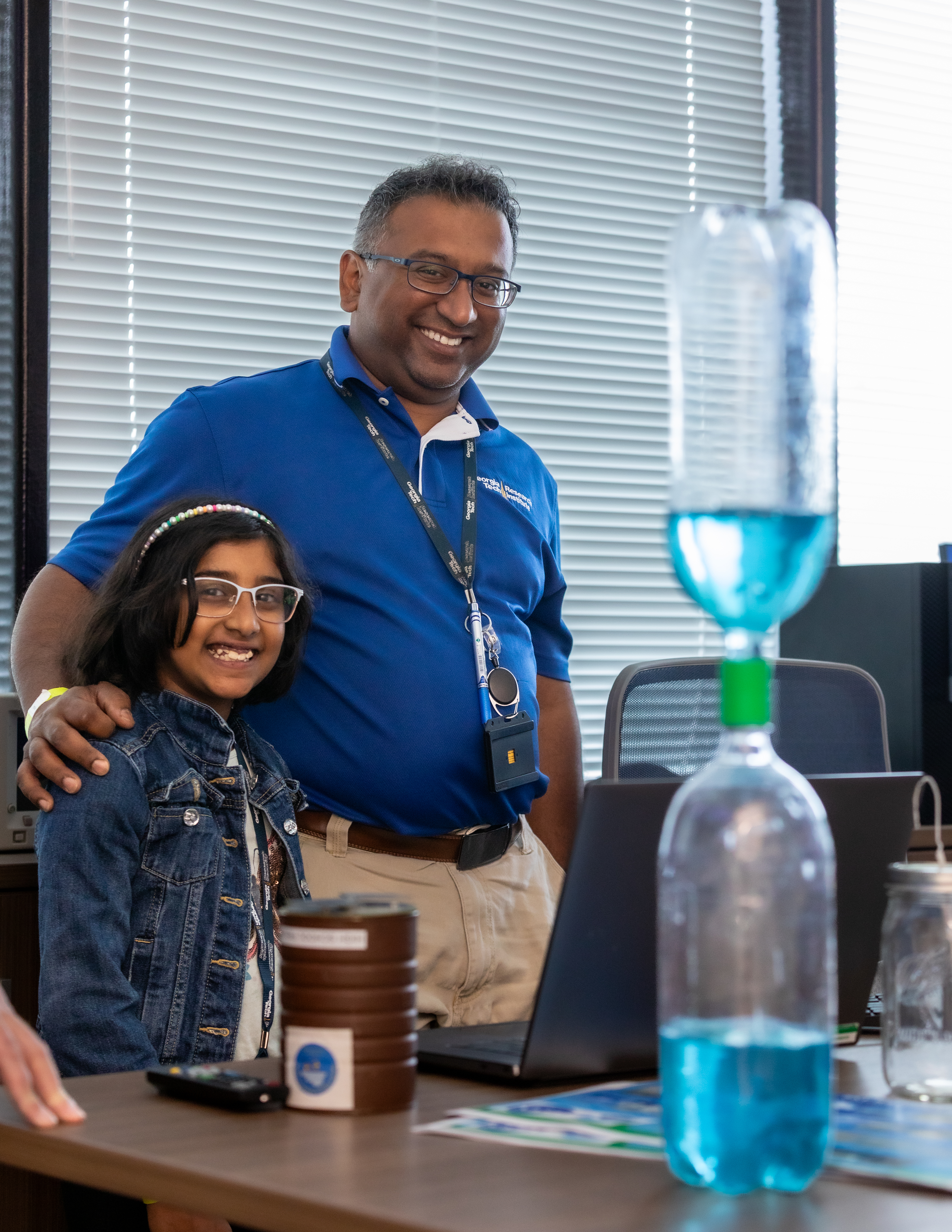 employee and child at research facility