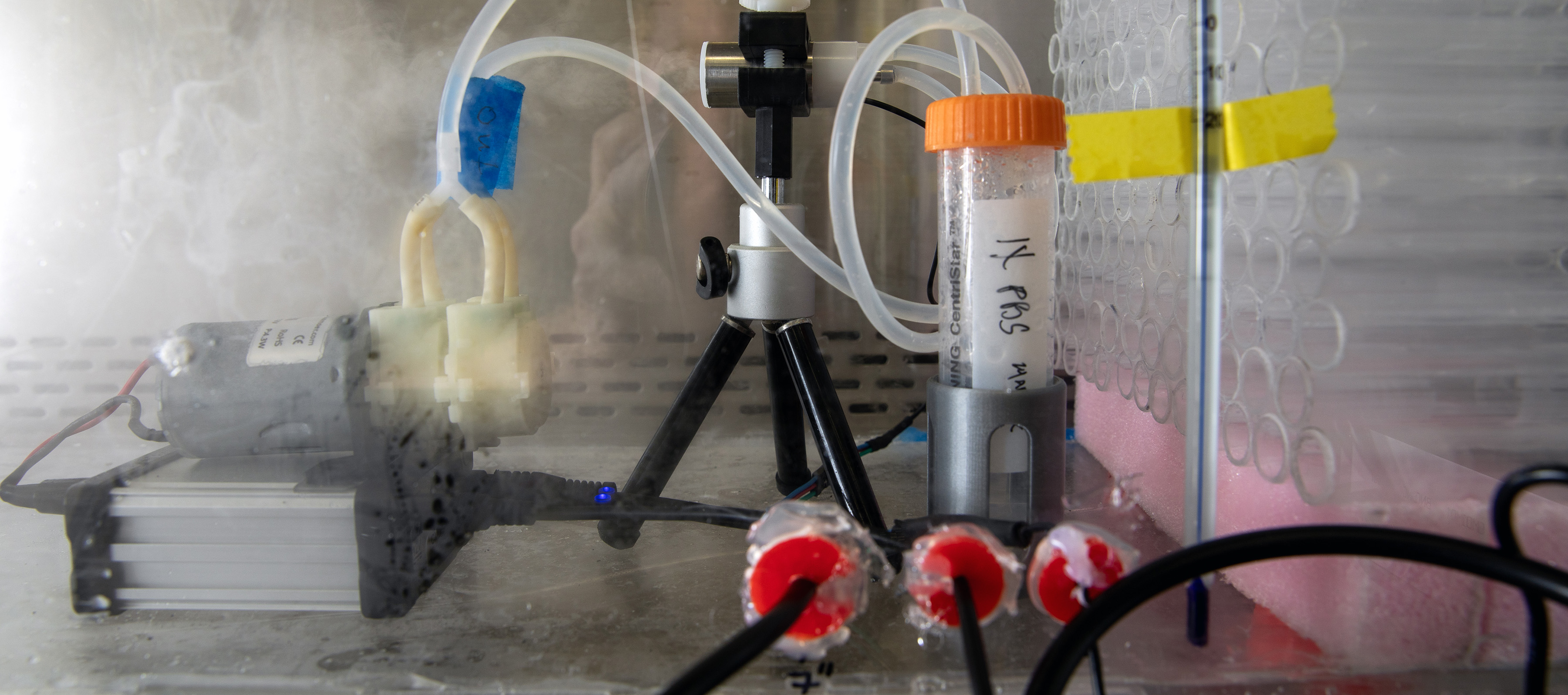Nebulizer produces an aerosol that will produce particles for study.
