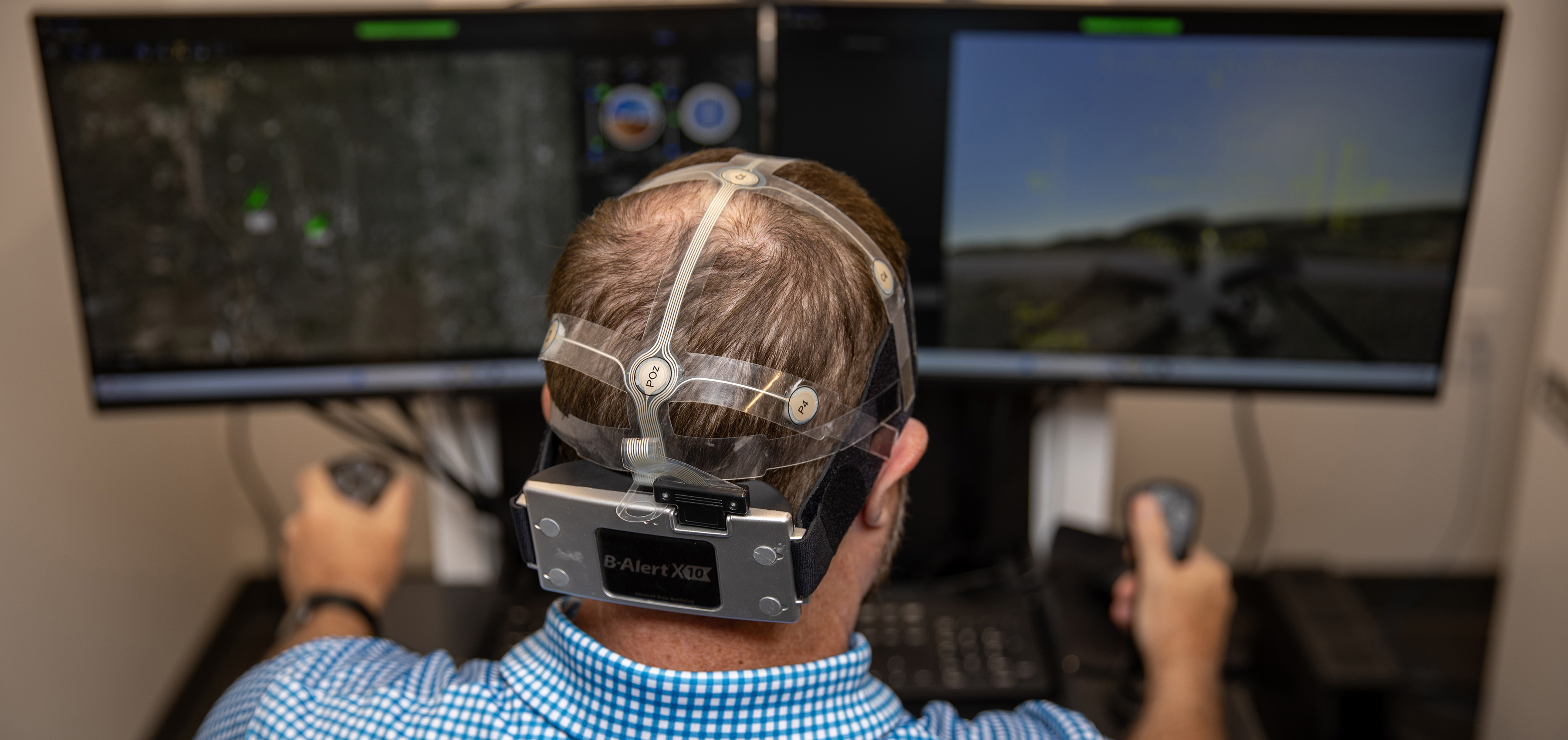 Researcher demonstrates mobile EEG device gathering brain electrical data