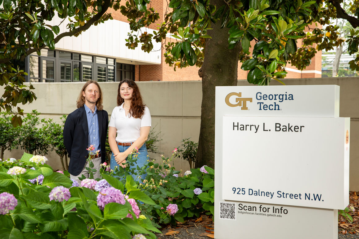 Chris Valenta and Lily Huff in front of Baker Building
