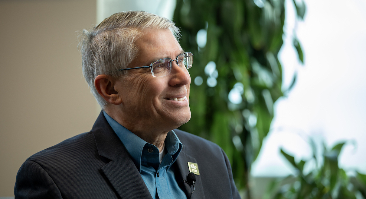 GTRI Director Mike Gazarik seating and smiling during an interview