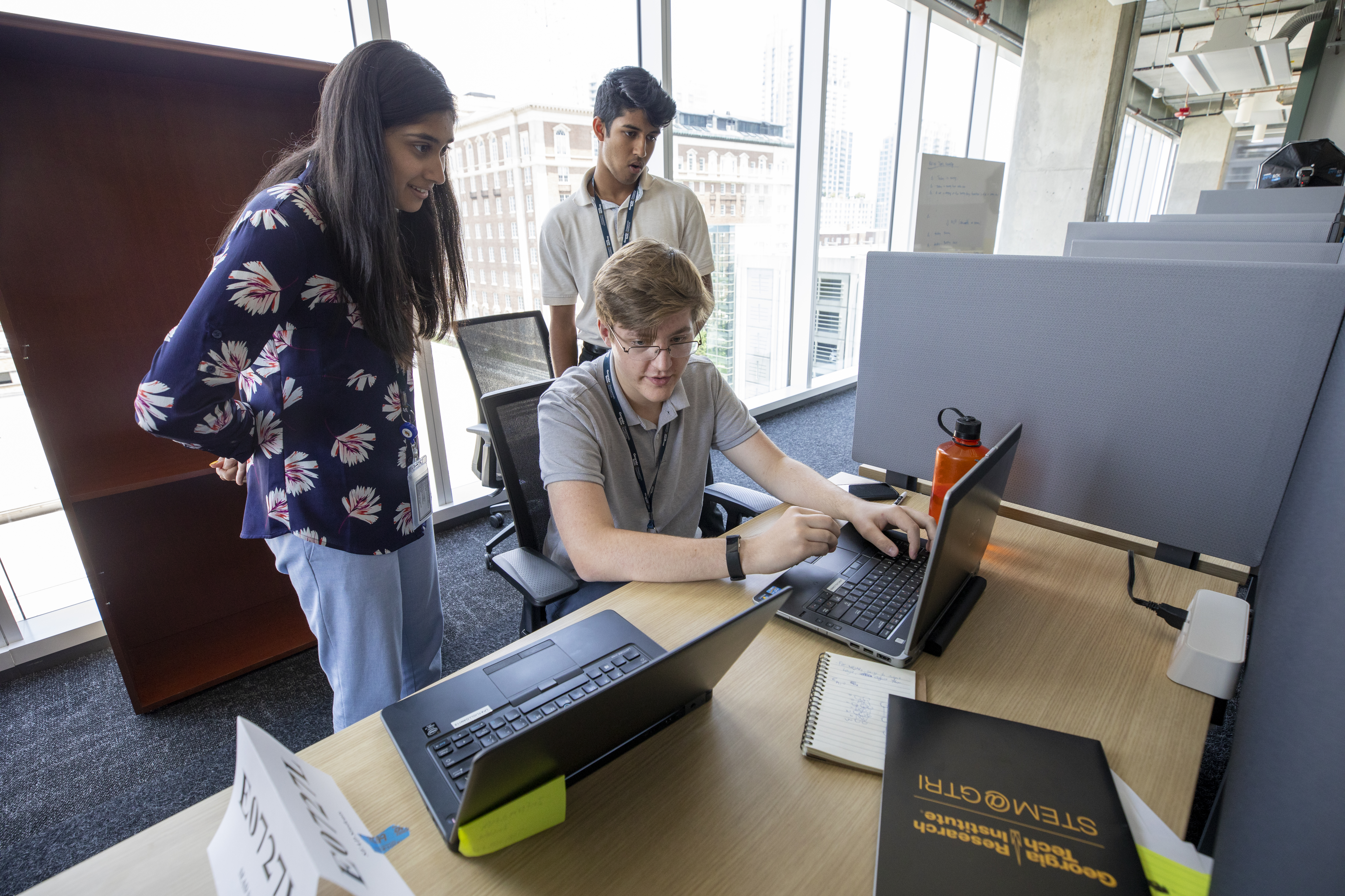 This image shows a group of high school students at a STEM summer internship. 