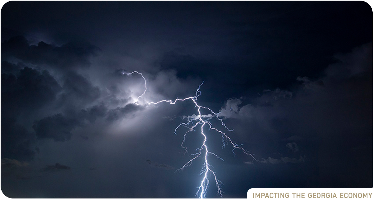 Cloudy night sky with huge lightning bolts