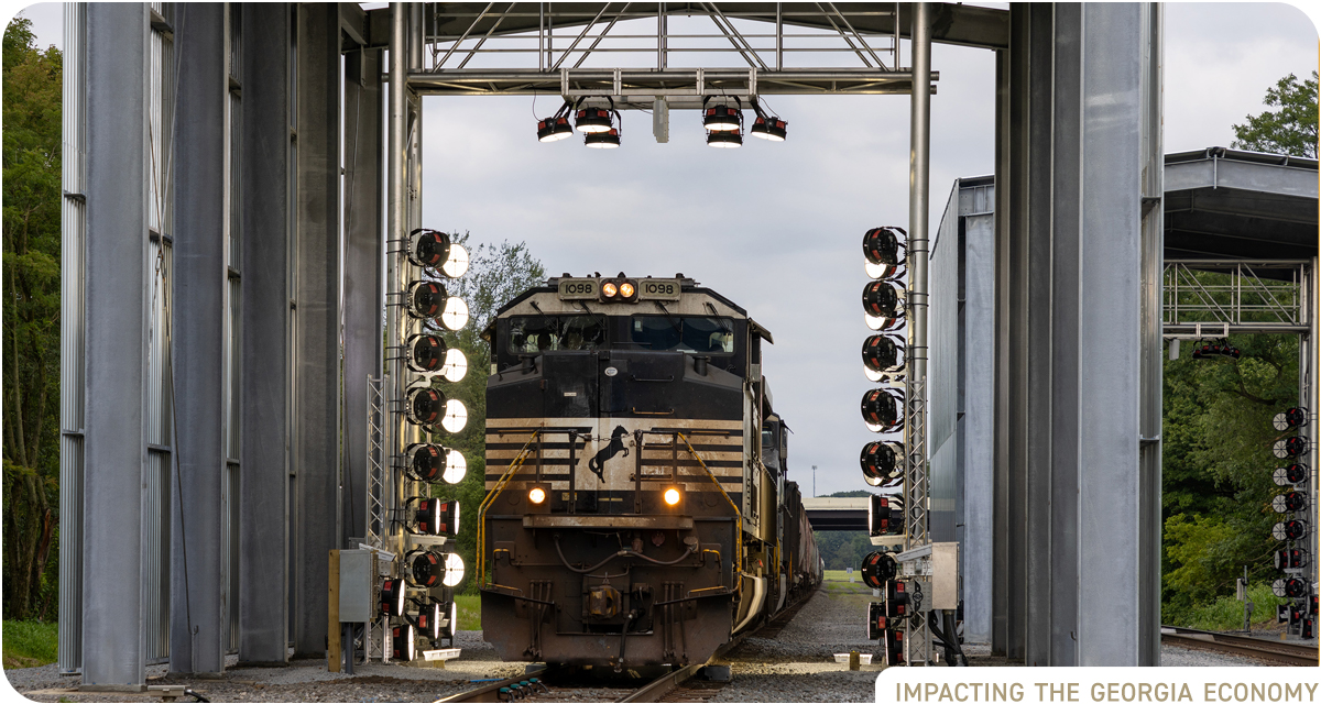 Train inside large metal inspection portal