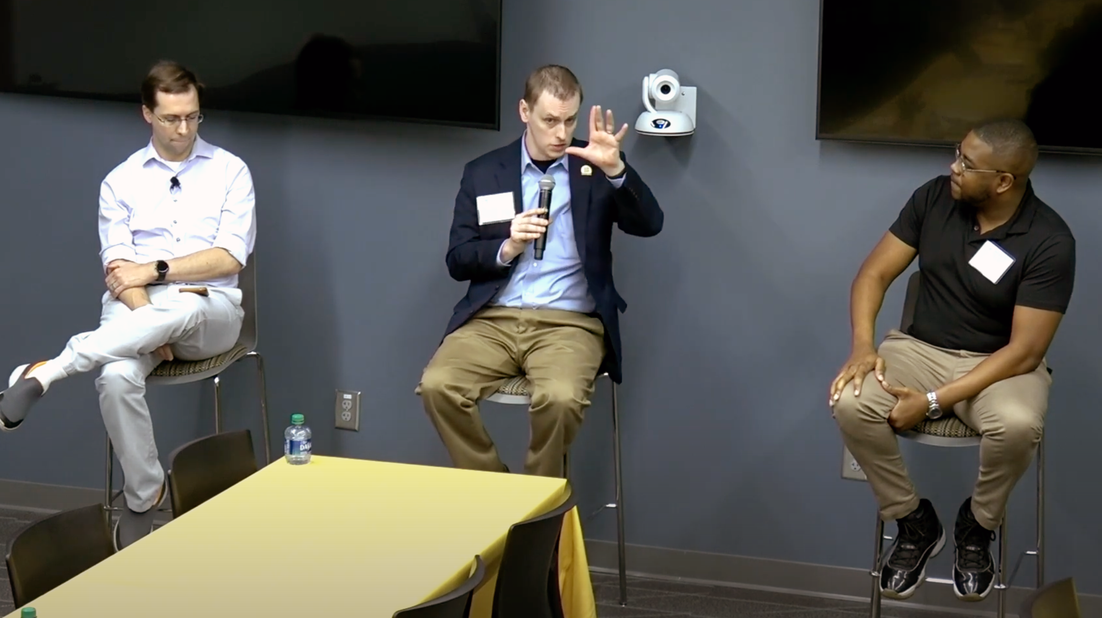 Stuart Michelson (center) speaks on a panel at the GT College of Computing as part of the events celebrating the GT Alumni Association "40 Under 40" honorees in 2023.