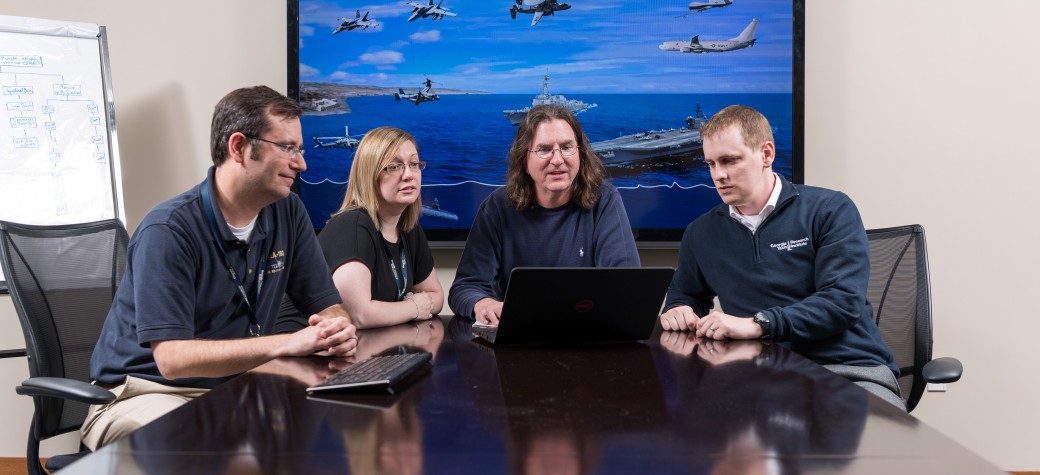 Stuart Michelson (far right) collaborates with other researchers.