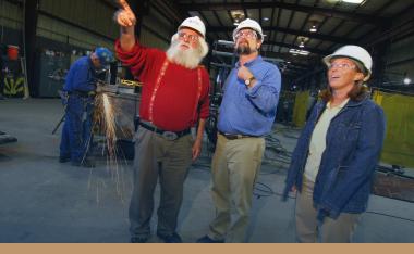 three researchers inspecting