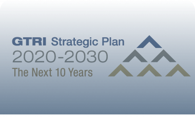 Text saying "GTRI Strategic Plan 2020-2030 The Next 10 Year" accompanied by six arrows making a mountain shape. (Credit Mel Goux)