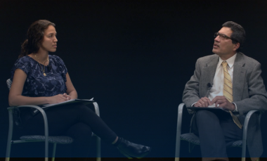 A photo of a panel discussion featuring a GTRI engineer. 