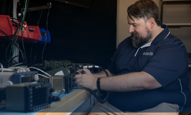 Researcher works on the GTRI-developed pilot vehicle interface.