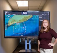 GTRI Research Scientist Tara Madden, shown with an AVIA screen, led development of the user interface.