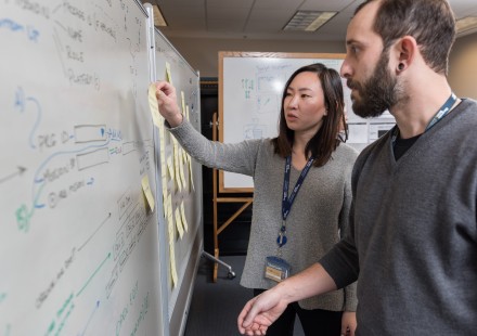 GTRI-Research-Scientist-Andrew-Baranak-and-Georgia-Tech-Graduate-Student-Rachel-Chen-discuss-creating-user-interface-workflows-for-the-mission-planning-task