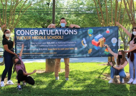 Tucker Middle School students celebrate their advancement to the national finals. Photo courtesy of Tucker Middle School.