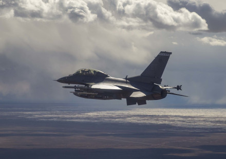 An F-16D prepares to drop four Collaborative Small Diameter Bombs