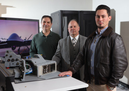 Researchers with prototypes of MQ-9 upgrades