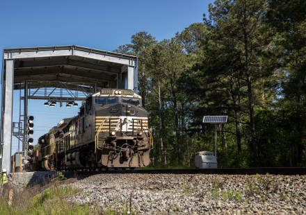 An image of a Norfolk Southern train passing through the company's digital train inspection portal near Jackson, GA.