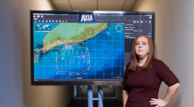 GTRI Research Scientist Tara Madden, shown with an AVIA screen, led development of the user interface.