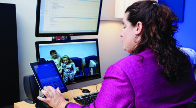 doctor using the telemedicine system at Marcus Autism Center