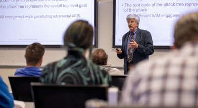 A GTRI researcher teaches a professional education course. 