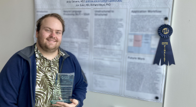 Andrew Stevens with award-winning poster.