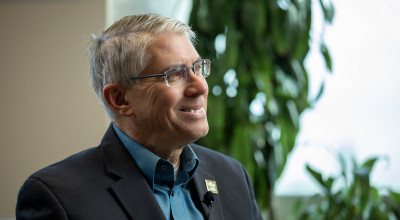 GTRI Director Mike Gazarik seating and smiling during an interview