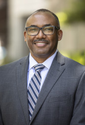 A headshot of William H. Robinson. 